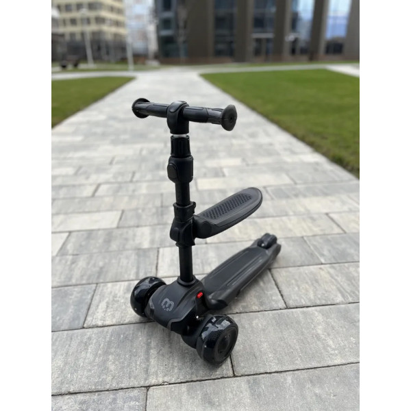 Детский самокат-беговел 2 в 1 Scooter Micar Moby Plus Чёрный со светящимися колёсами и передними амортизаторами